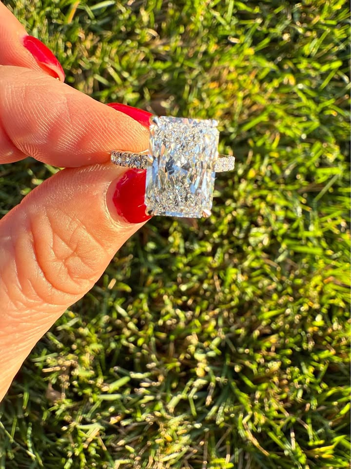 5.10 Carat Radiant Diamond Ring. Set On Half Carat 14K White Diamond Band.