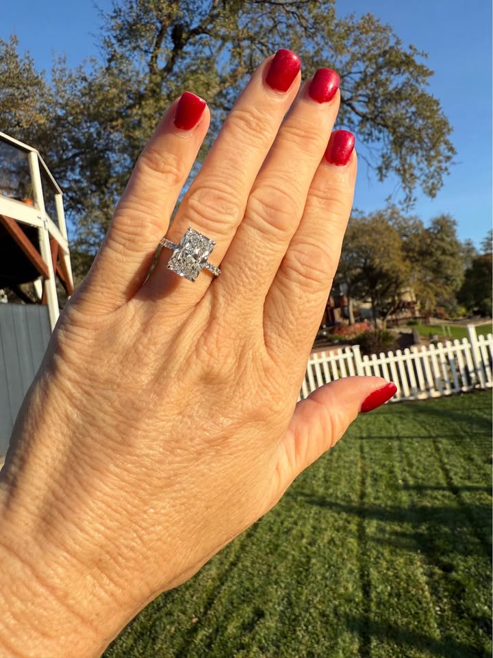 5.10 Carat Radiant Diamond Ring. Set On Half Carat 14K White Diamond Band.
