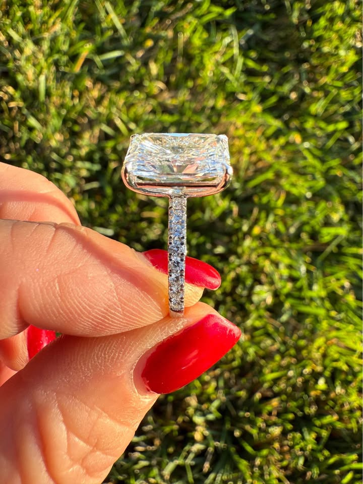 5.10 Carat Radiant Diamond Ring. Set On Half Carat 14K White Diamond Band.