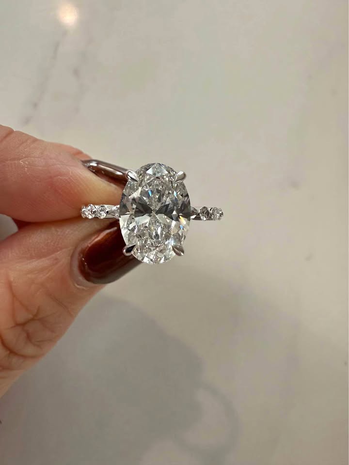 4.09 Carat Oval Diamond Ring. Set On 14K White Gold Band.