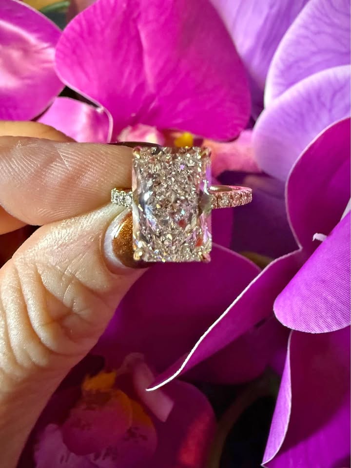 5.04 Carat Radiant Diamond Ring. Set On Half Carat 14K Yellow Gold Band