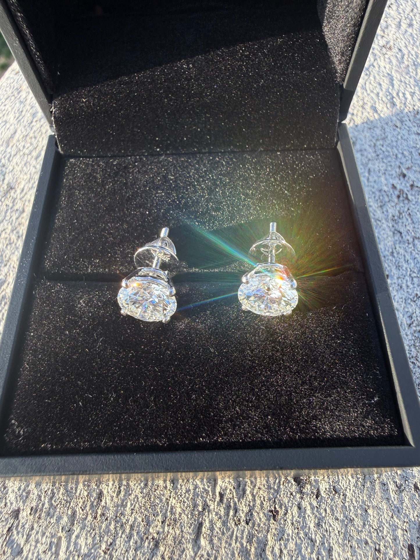 4 Total Carat Weight Round Diamonds Earrings. Set On 4 Prong 14K White Gold Setting.