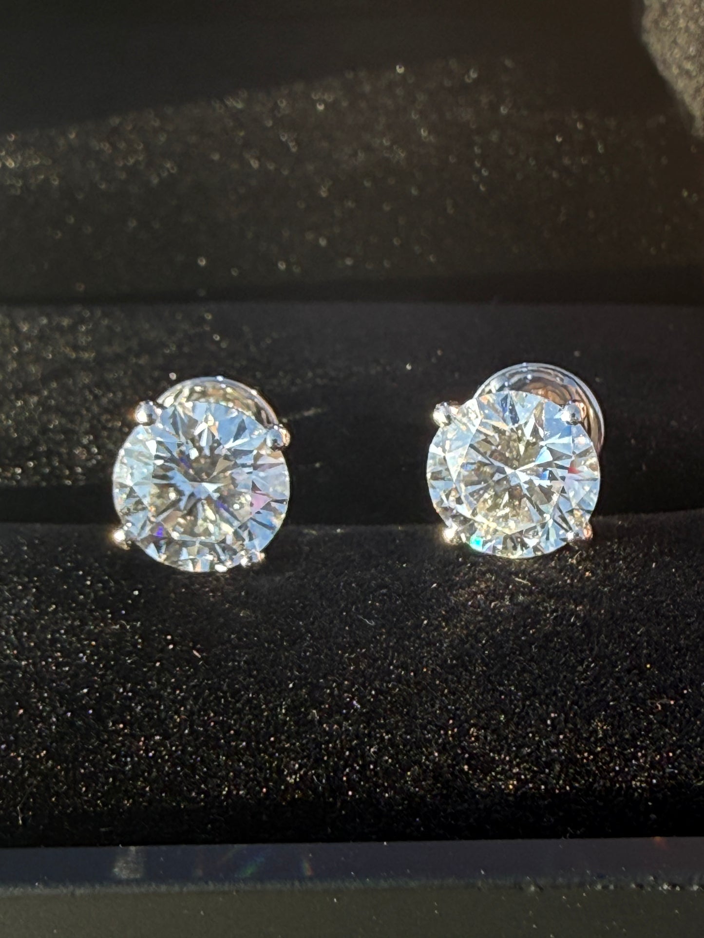 4 Total Carat Weight Round Diamonds Earrings. Set On 4 Prong 14K White Gold Setting.