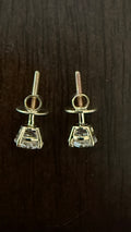 1 Total Carat Weight Round Diamond Earrings. Set On 4 Prong 14K Yellow Gold.