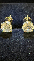 3 Total Carat Weight Round Diamond Earrings, E/VS1. Set On 4 Prong 14K Yellow Gold Setting.
