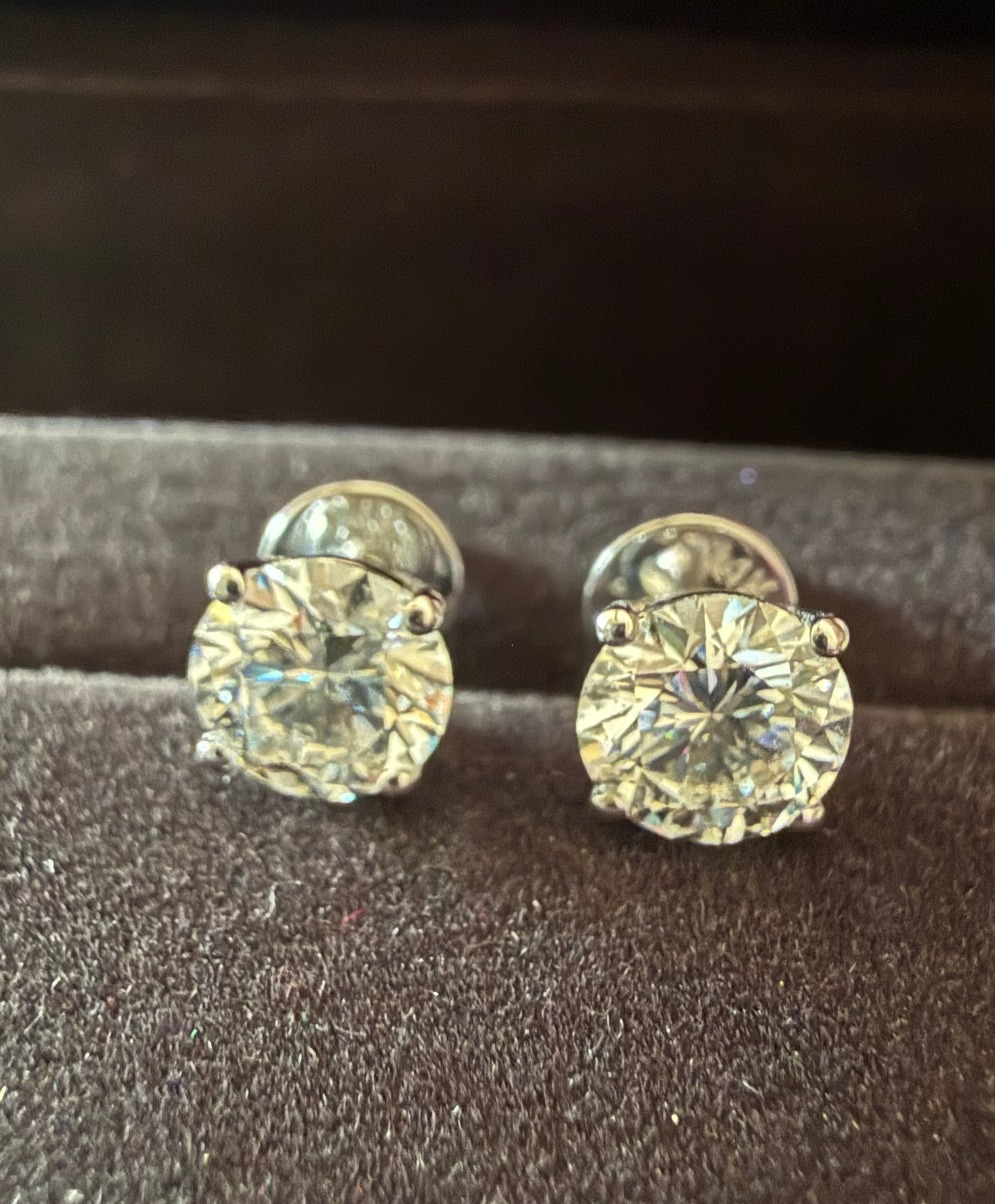 2 Total Carat Weight Round diamond Earrings. Set on 4 Prong 14K White Gold Setting.