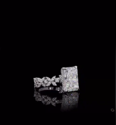 5 carat e vvs2 radiant with 2.5 carat marquise band set in 14k white gold