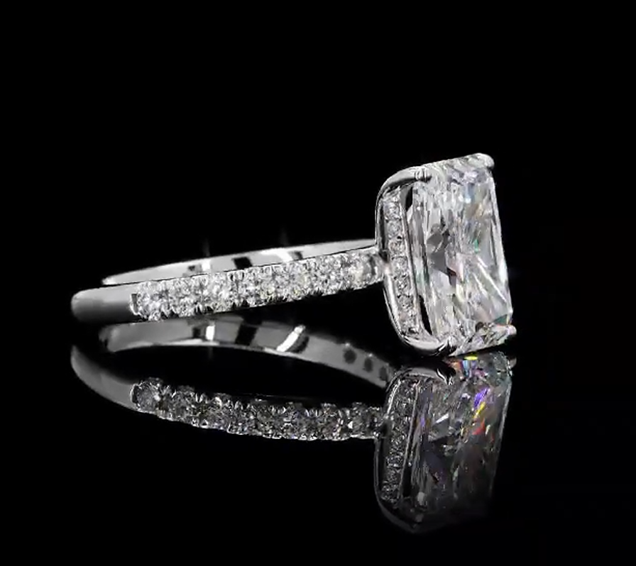 3 carat e vvs2 radiant on a 14k White gold half carat diamond band with diamond hidden halo