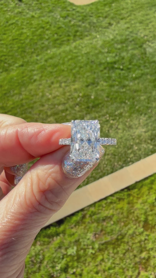 5.10 Carat Radiant Diamond Ring. Set On Half Carat 14K White Diamond Band.