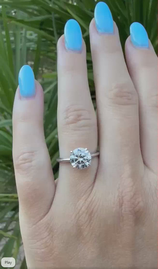 Sophisticated 2 carat Round cut E VVS2 diamond on solitaire 14k white gold band