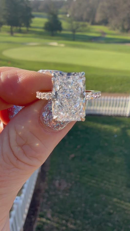 5.04 Carat Radiant Diamond Ring. Set On Half Carat 14K Yellow Gold Band