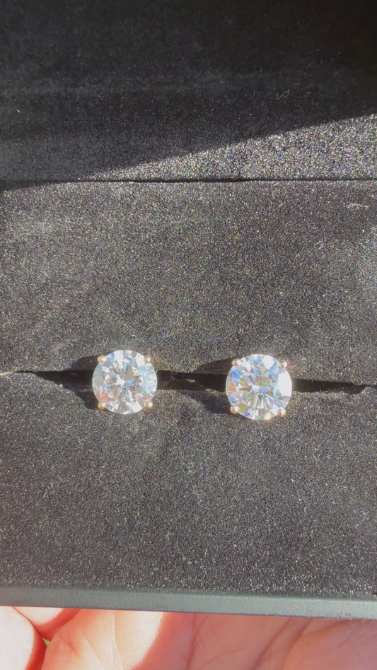 4 Total Carat Weight Diamond Earrings. Set On 4 Prong 14K Yellow Gold Setting.
