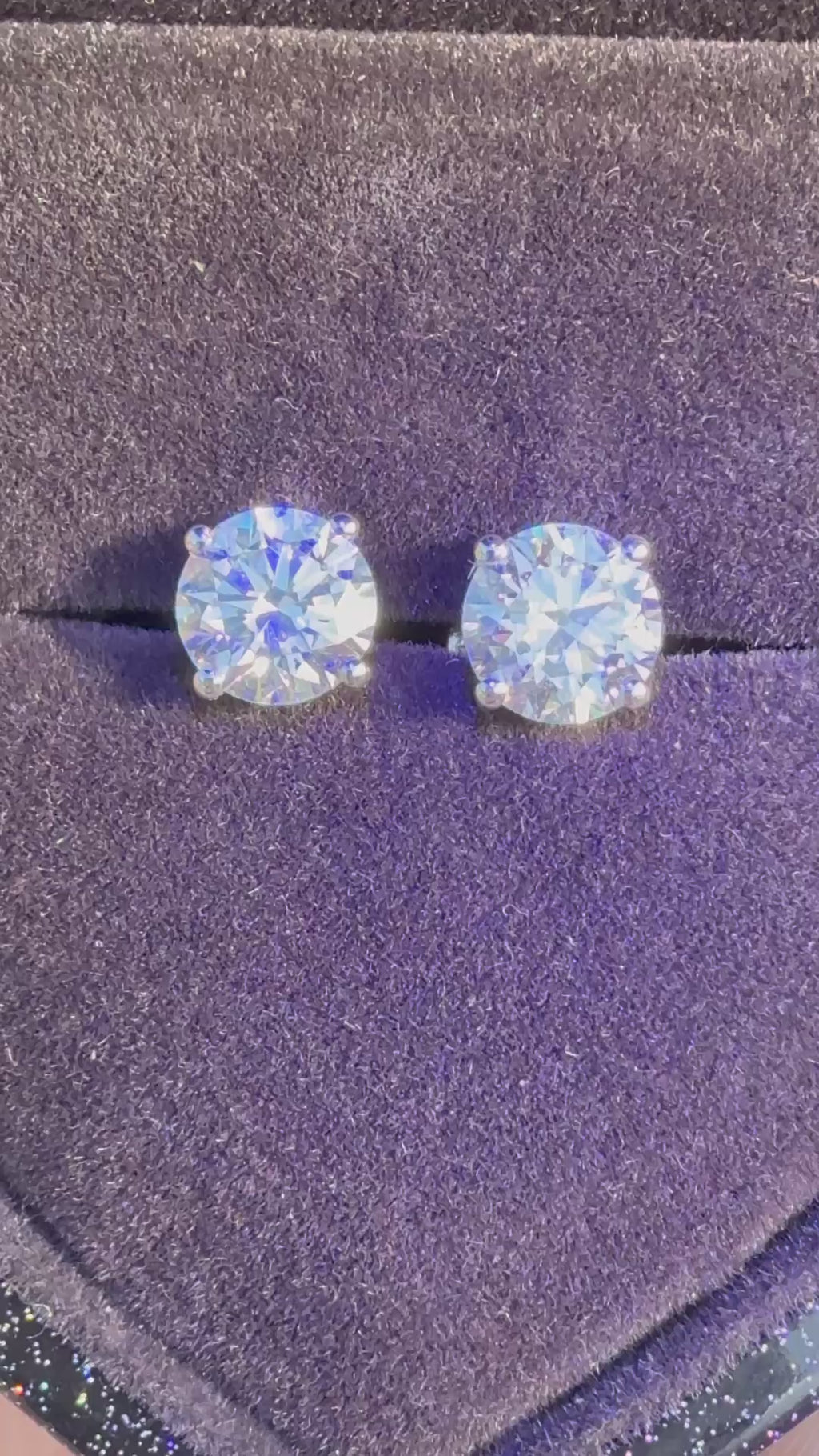 2 Total Carat Weight Round diamond Earrings. Set on 4 Prong 14K White Gold Setting.